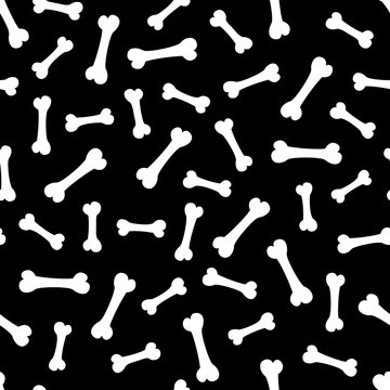 Seamless pattern with bones on the black background.