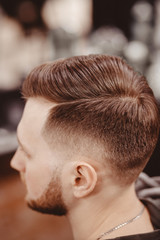 Obraz premium Vertical photo of man after barber, Hairstyle with parting