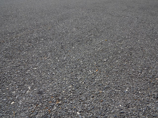 asphalt road with autumn leaf texture
