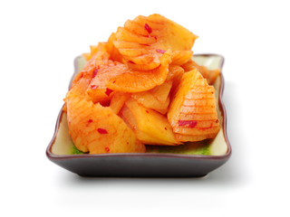 sliced radish kimchi  on white background