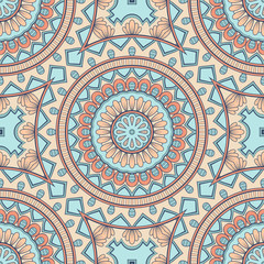 Decorative colorful ethnic seamless pattern for fabric or wrapping in oriental style. Hand drawn illustration