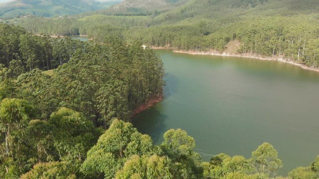 Aerial view beautiful nature with mountains and hills by Lake Mattupetty. Kerala State. Near the city of Munar.