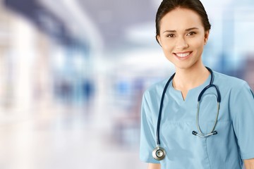 Young man doctor holding stethoscope