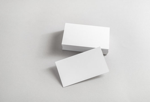 Photo of blank business cards on paper background. Template for ID.
