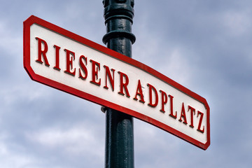 Austria, Vienna, Prater: .Old vintage retro style giant wheel square (Riesenradplatz) sign on green...