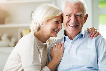 Happy senior couple at home