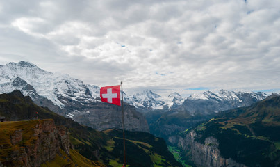 Swiss flag in the alps