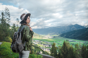 Young attractive tourist with a backpack