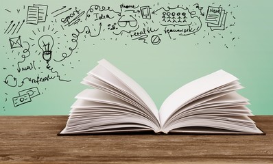 Open book with  drawing on  background