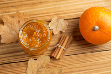 Homemade Pumpkin puree/jam on wooden background
