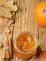 Homemade Pumpkin puree/jam on wooden background