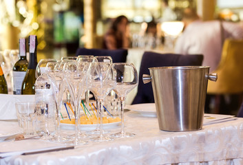 empty glasses for champagne on a buffet table