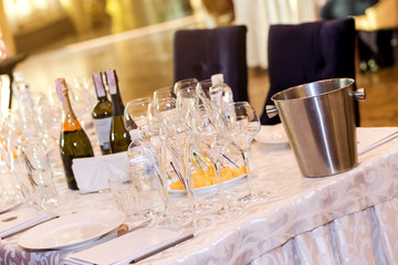 empty glasses for champagne on a buffet table