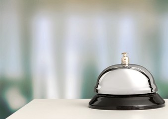 Vintage hotel reception service desk bell.