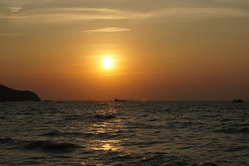 Sunrise over the sea and beautiful cloudscape.