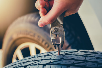 Hand pulling for Removing a Nail in the Tire,Flat tire Fixing and Repair the tire is leaking from...