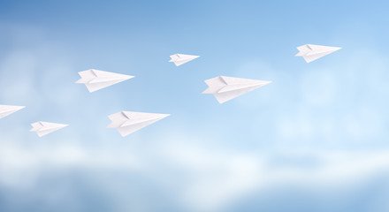 Business competition concept with white paper planes fly on sky background. copy space