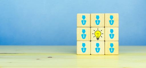 Brainstorming, Creative, New idea, innovation and solution concept. Wooden cubes with the yellow light bulb and businessman icons symbol with copy space