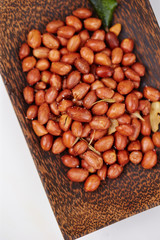 Roasted and salted peanuts with skins