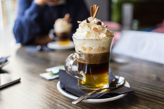 Close up of cup of irish coffee with cream at restaurant