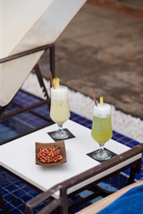 Resort hotel drinks and snack at pool side