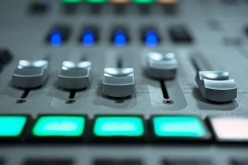 mixing console fader. music and light production, broadcasting concept