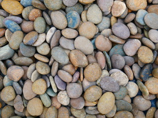pebbles on the beach stone background