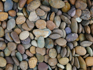 pebbles on the beach stone background