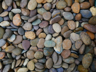 pebbles on the beach stone background