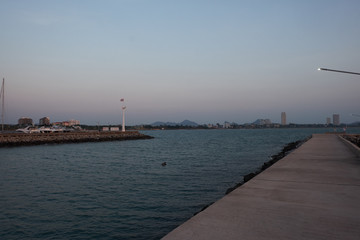 View of the sunset city from the pier in Pattaya