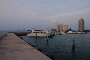 View of the sunset city from the pier in Pattaya