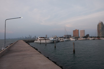 View of the sunset city from the pier in Pattaya