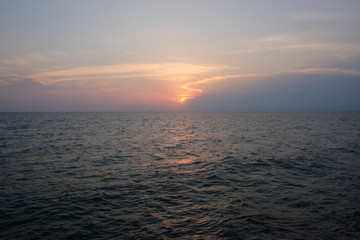 View of the sunset city from the pier in Pattaya