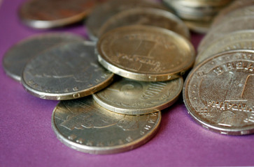 stacks of coins from the Ukrainian bank. Coins of Ukrainian type: Kopek. Concept of banking, taxes, debt, with a blurred background.