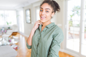 Fototapeta premium Beautiful young african american woman smiling cheerful, friendly face laughing confident
