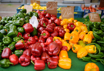 Fresh healthy bio red, green and yellow paprika on farmer agricultural market
