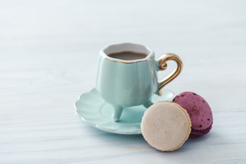 Coffee cup and macarons