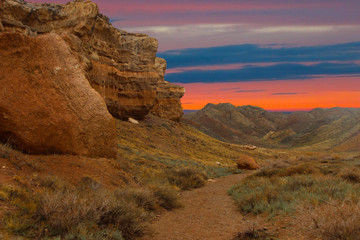 national park, sunset among the stones, colored mountains, travel to the canyon
