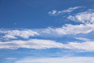 Naklejka na ściany i meble background of blue sky and more white clouds