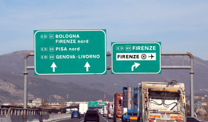 Italian motorway with many indications to main cities