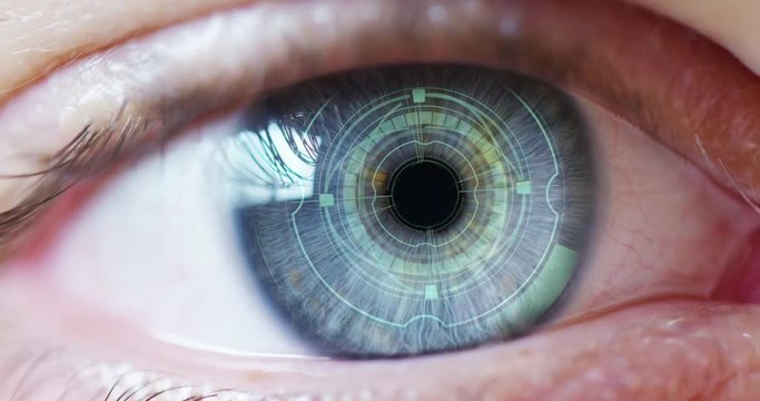 Slow motion of  young male blue eye with high technology  futuristic virtual reality for personal safety scanning.