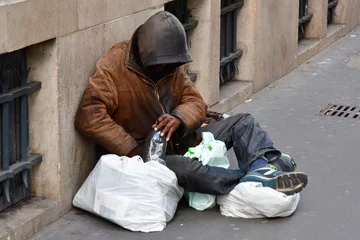 Foto op Canvas Paris  France - april 2 2017 : an homeless man © PackShot