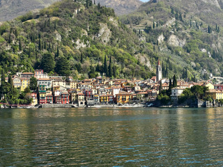Fototapeta na wymiar Varenna, Italy March 30 2019 Frontal Lanscape view of Varenna Town at Lake Como Italy
