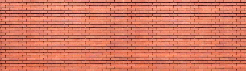 Abstract red brick wall texture background. Horizontal panoramic view of masonry brick wall for interior design.