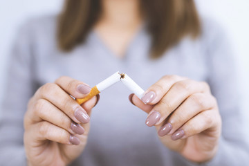 woman refusing cigarettes concept for quitting smoking and healthy lifestyle.or No smoking campaign...