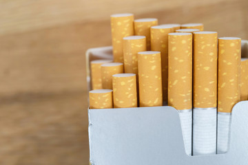 peel it off Cigarette pack prepare smoking a cigarette. Packing line up.  photo filters Natural light.