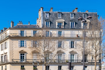 Paris, beautiful building rue de Belzunce, typical parisian facades and windows