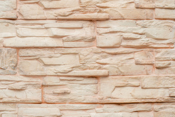 Photo of a decorative brick pink wall