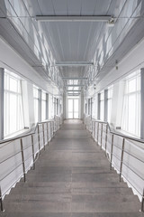 White tunnel stairs down