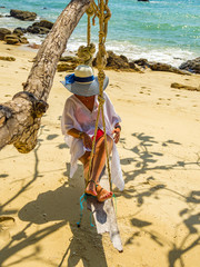 Woman relaxing at the beach